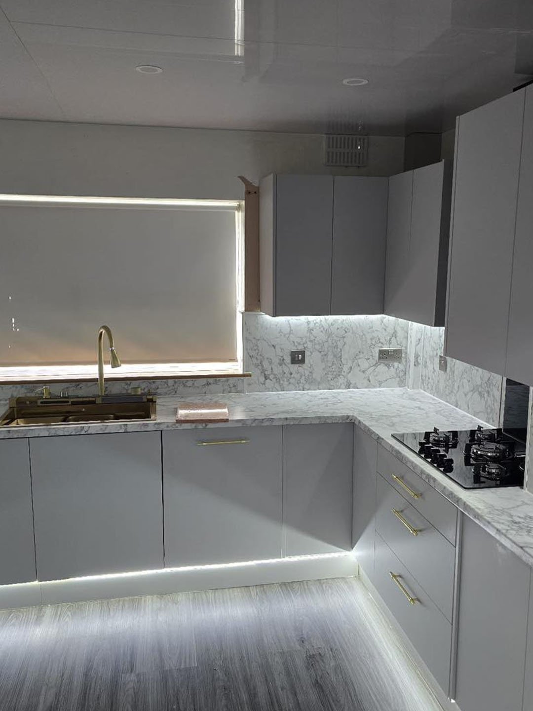 Modern luxury kitchen renovation with fitted cabinetry and island